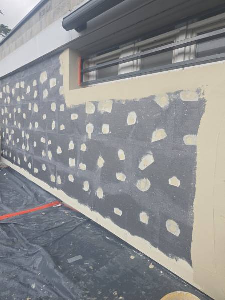 Panneaux d'isolation et enduit