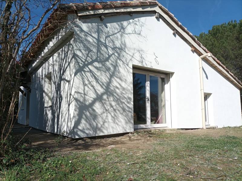 Finition avec un crépi minéral d'un chantier d'ITE -Gers 